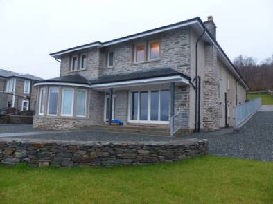 Stewart Shaw builders in Dunoon took on the new build project at Jacaranda, Kilbride Road, Dunoon, building Jacaranda in the style of the house which previously stood here. Builders Dunoon - House rebuild Dunoon - New build Dunoon - Jacaranda, Kilbride Road, Dunoon Stewart Shaw